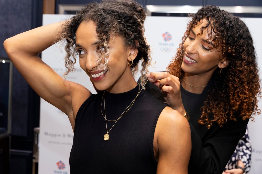 Olympians and twin sisters Laviai and Lina Nielsen model items from the range at the launch