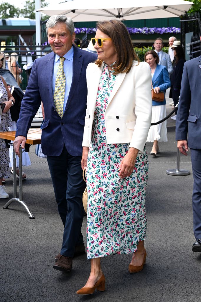 Michael Middleton and Carole Middleton attend day four of the Wimbledon Tennis Championships at the All England Lawn Tennis and Croquet Club 