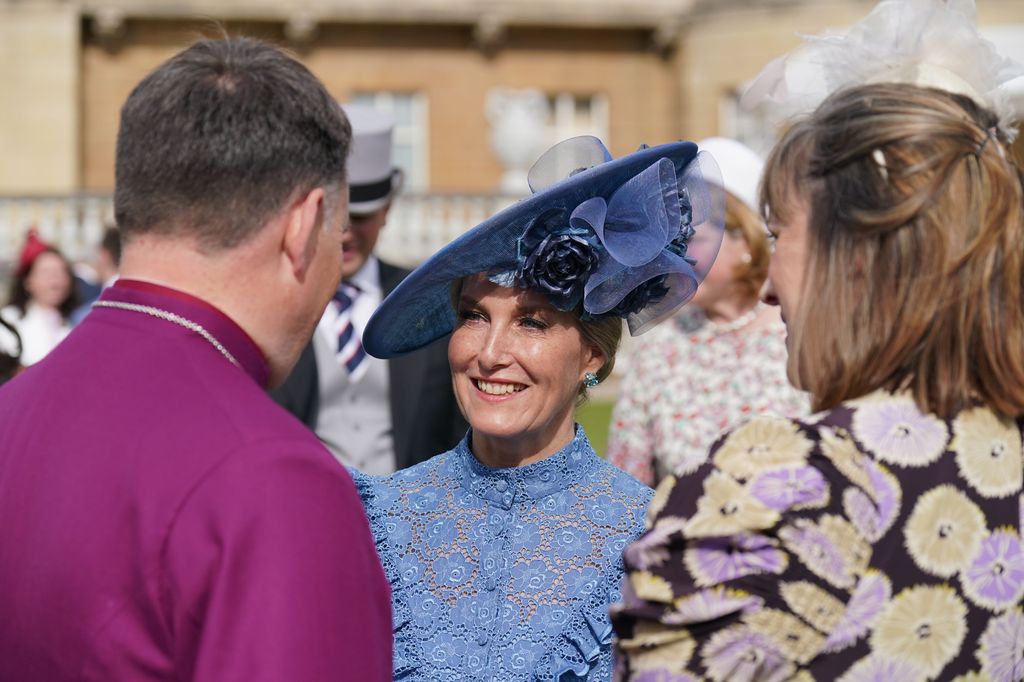 Duchess Sophie speaking to two people
