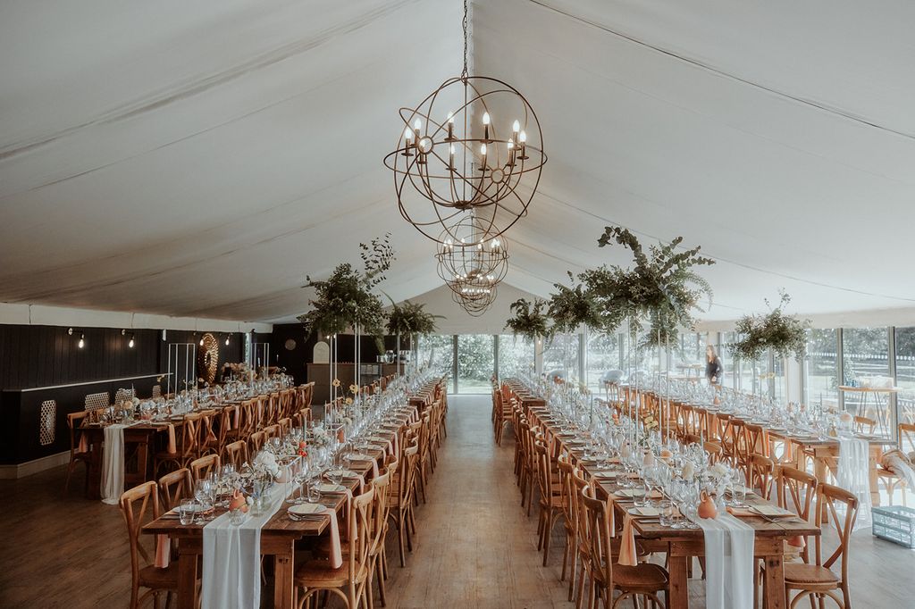 Wedding tables inside a marquee