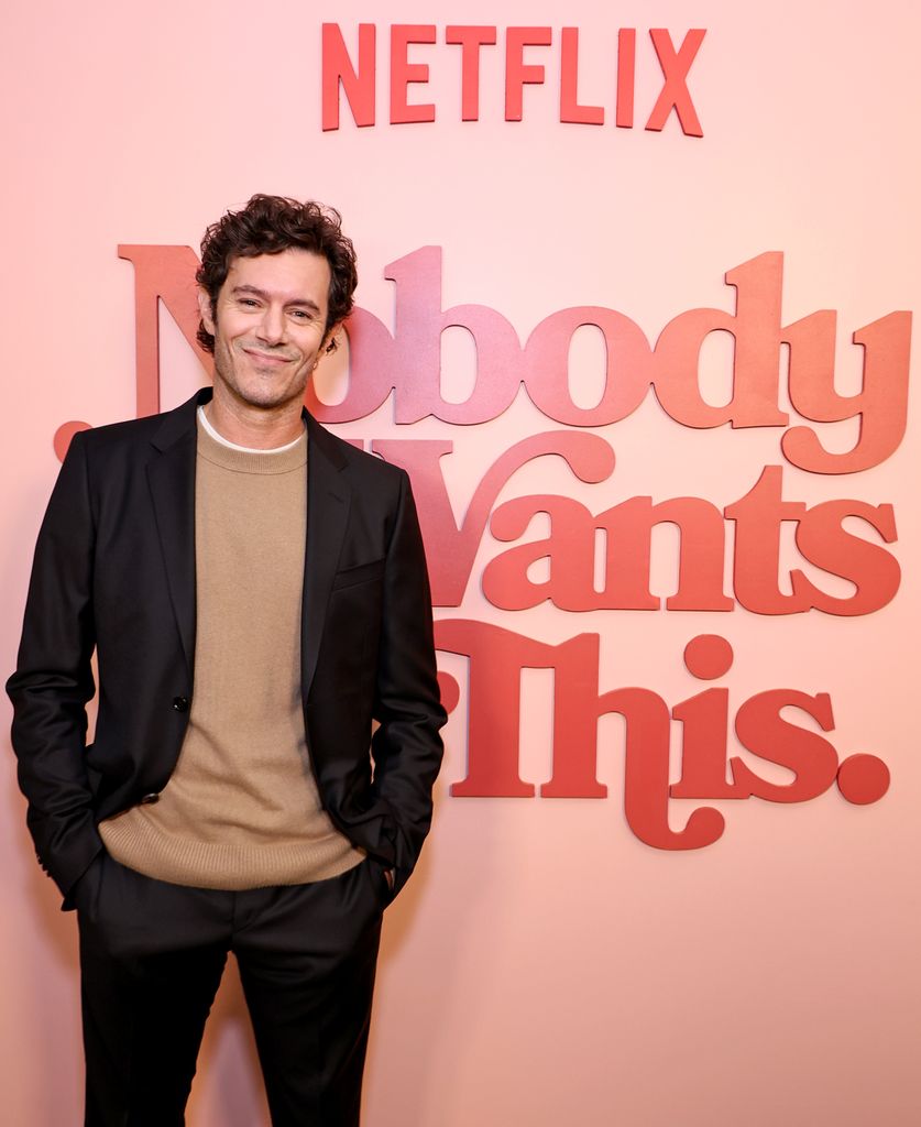 Adam Brody is promoting the Netflix series “Nobody Wants This.”