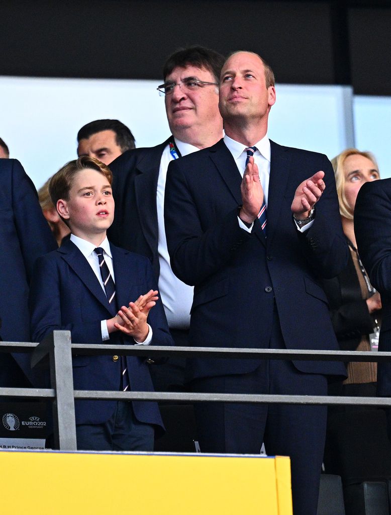 Prince of Wales, and Prince George in the stands before the match