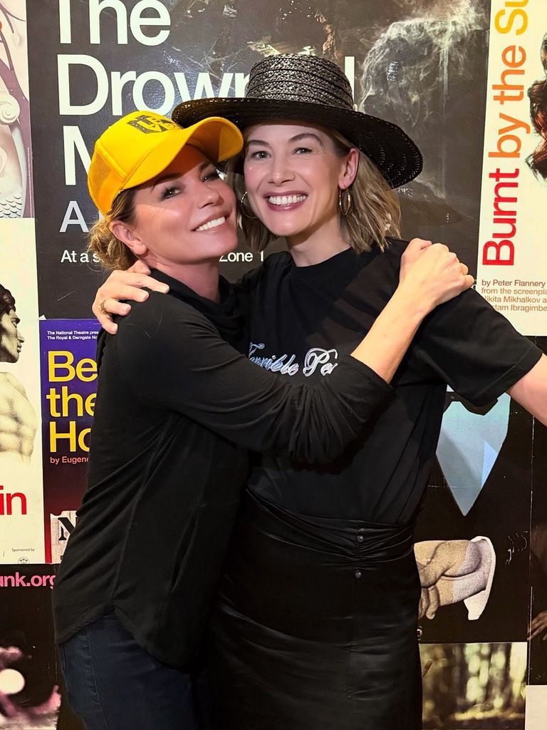 Shania Twain and Rosamund Pike pose for a photo backstage after "Inter Alia" at the National Theatre in London, shared on Instagram