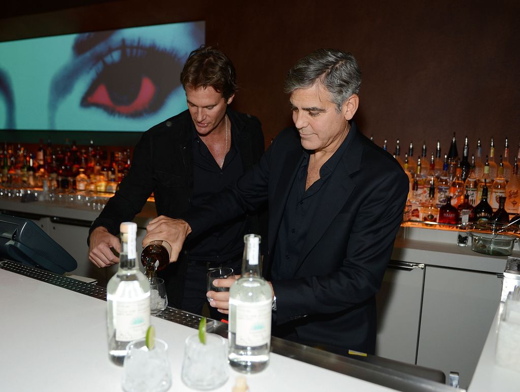 Casamigos Tequila founders Rande Gerber and George Clooney celebrate the launch of Casamigos at Andrea's at Encore Las Vegas on January 9, 2013 
