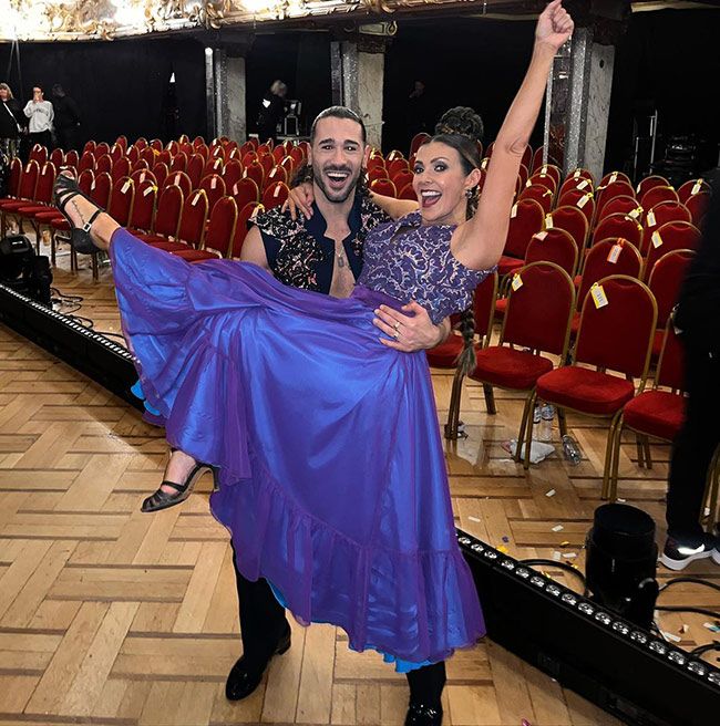 Graziano di Prima holding Kym Marsh as they celebrate inside the Blackpool Tower Ballroom