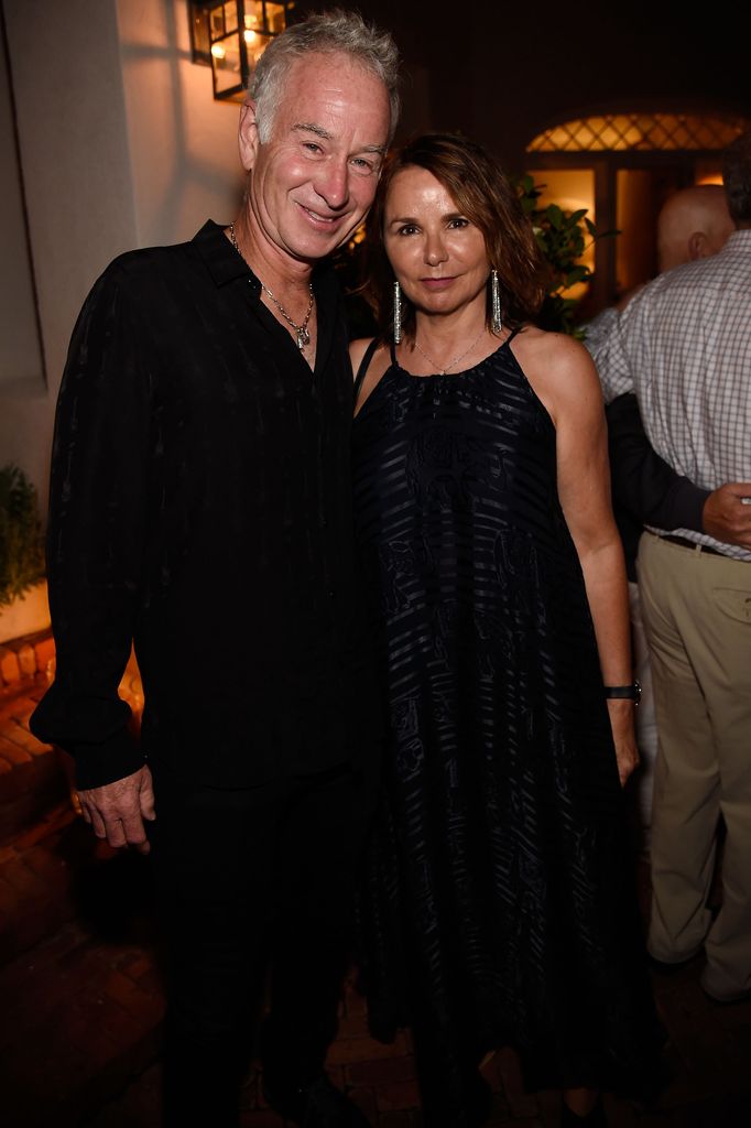 John McEnroe and Patty Smyth in matching black outfits