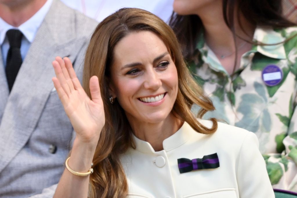 Kate Middleton waving to a crowd
