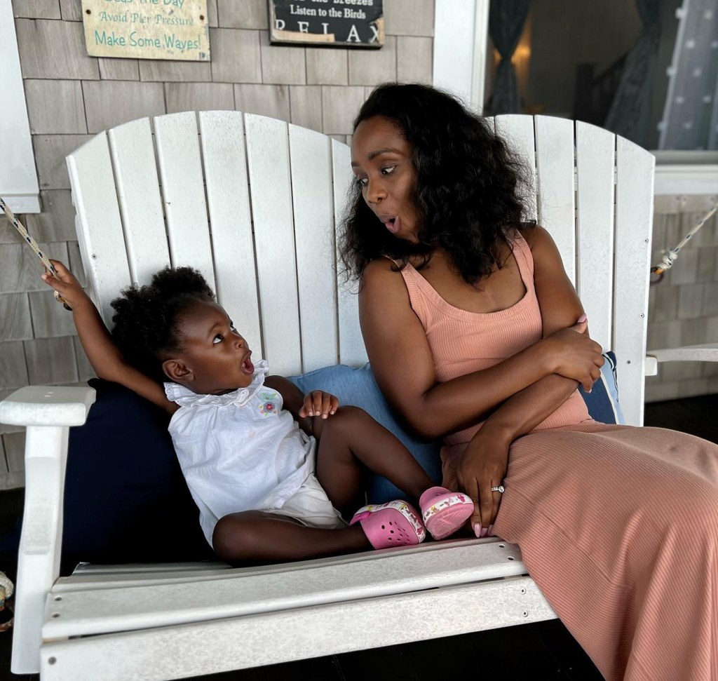 Photo posted by CNN anchor Abby Phillip on Instagram August 2023 pictured sitting on a bench with her young daughter Naomi, who turns two on August 16.