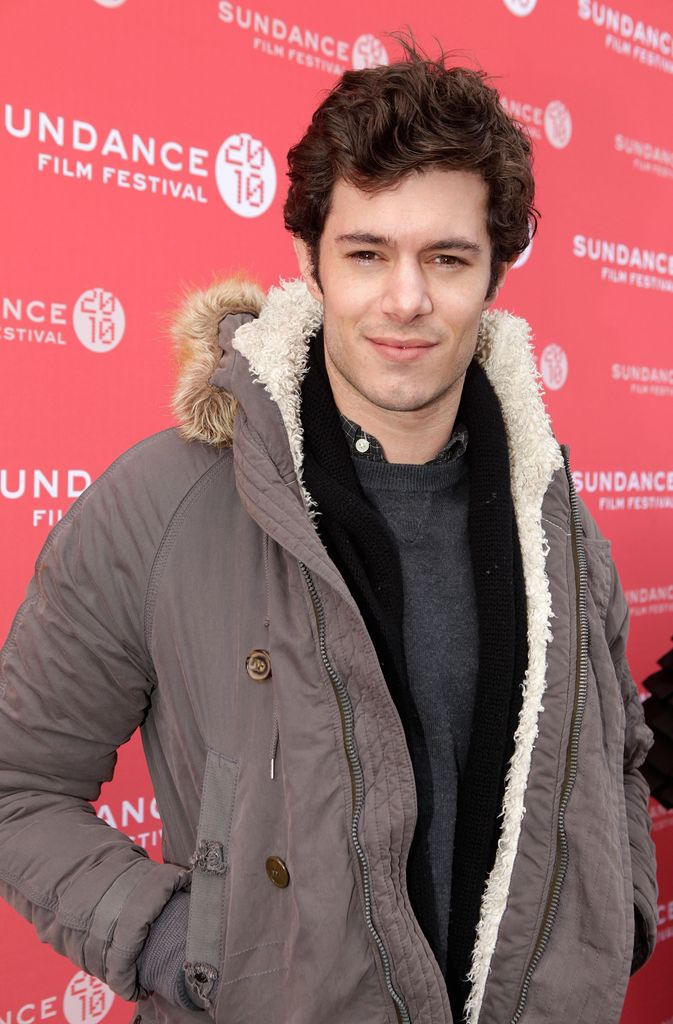 Adam Brody in a duffle coat on the red carpet