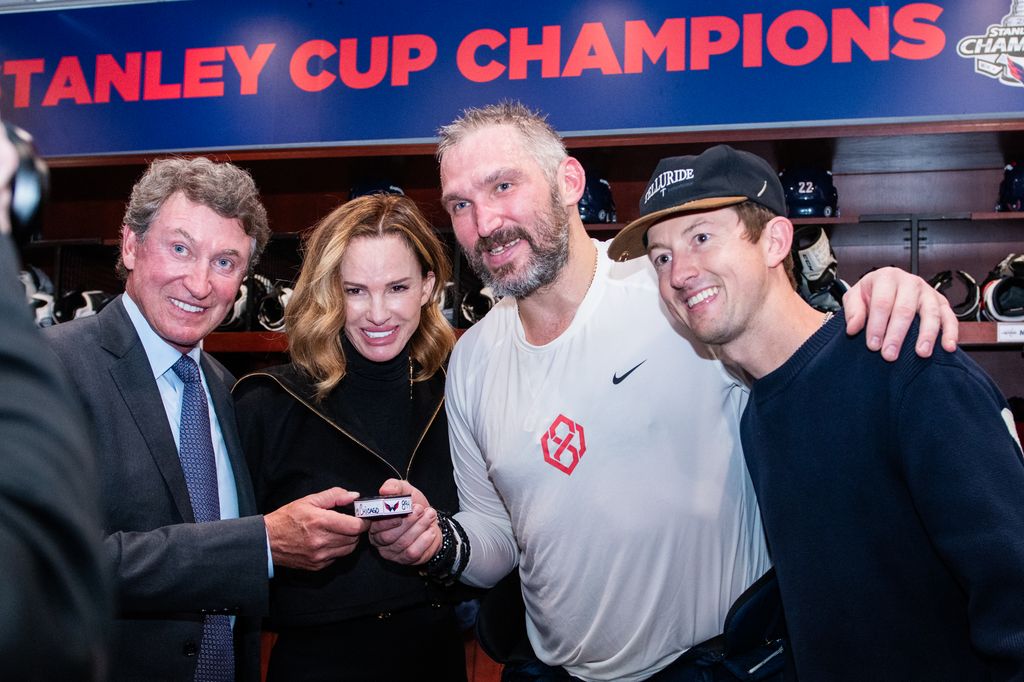 WASHINGTON, DC - APRIL 04: Alex Ovechkin #8 of the Washington Capitals poses for a photo with Wayne Gretzky, his wife Janet and son Ty at Capital One Arena on April 04, 2025 in Washington, DC. (Photo by Sophia Price/NHLI via Getty Images)
