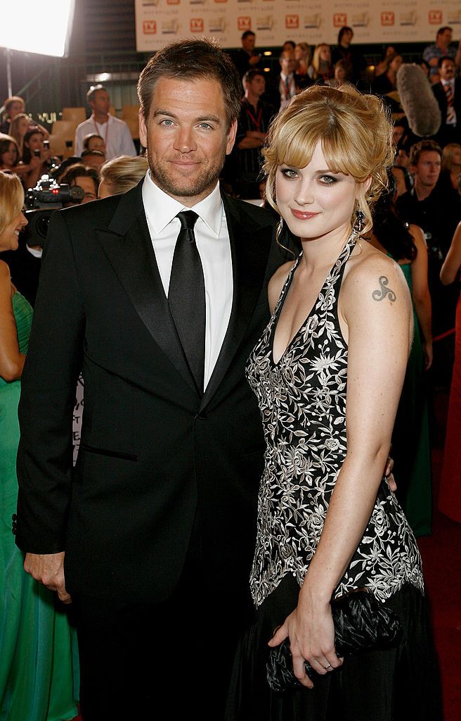 Michael Weatherly and Alexandra Breckenridge pose on the red carpet 