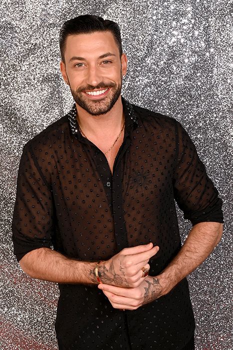Giovanni Pernice posing with his Strictly Come Dancing outfit on
