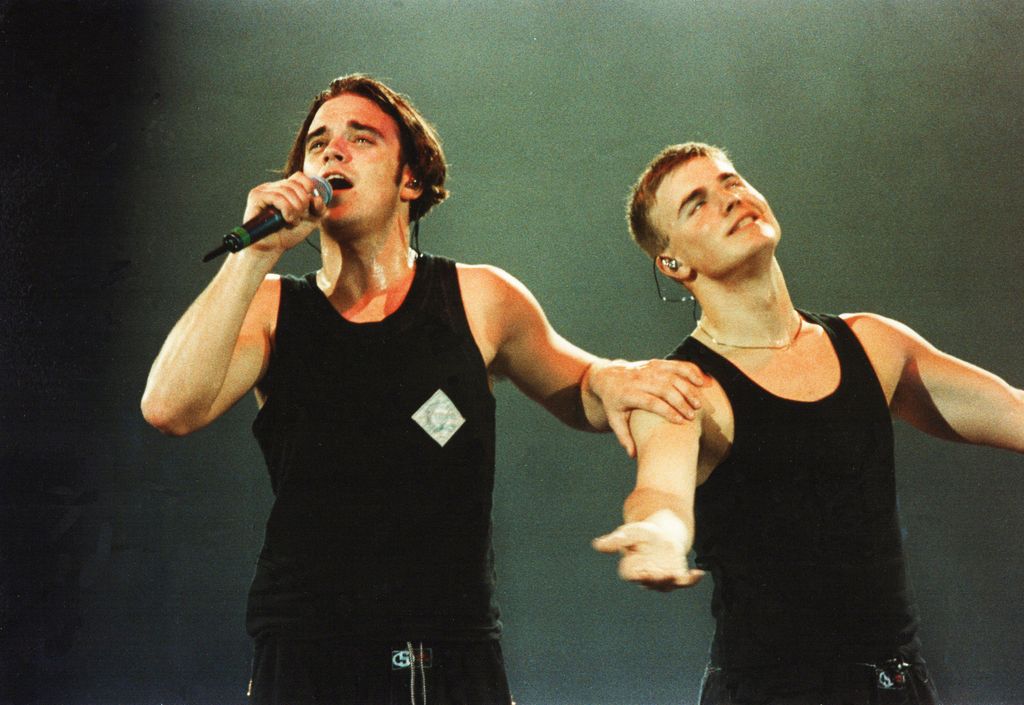 Gary and Robbie performing on stage in 1993 