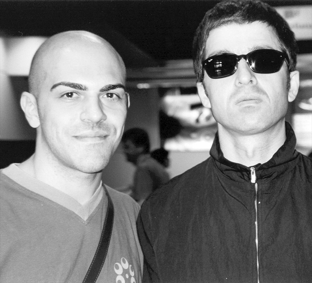 black and white selfie of Noel Gallagher with fan Fabio D'Antonio
