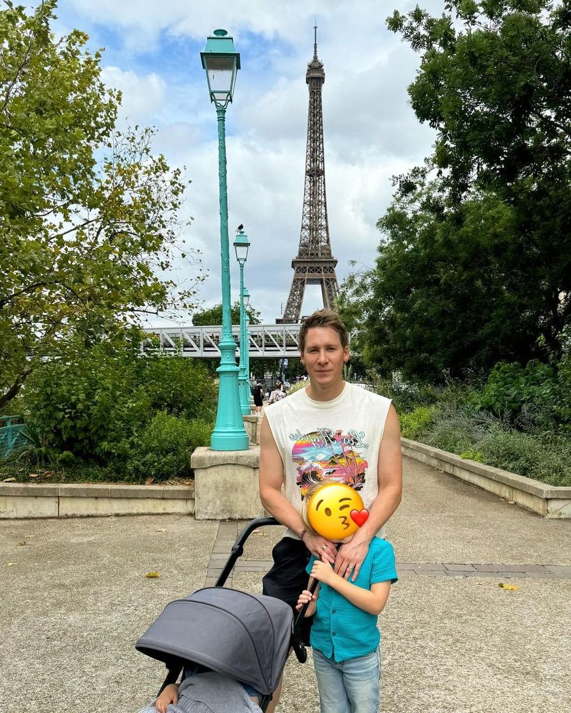 Robbie has grow up so fast! The five-year-old stood beside his dad Dustin in Paris