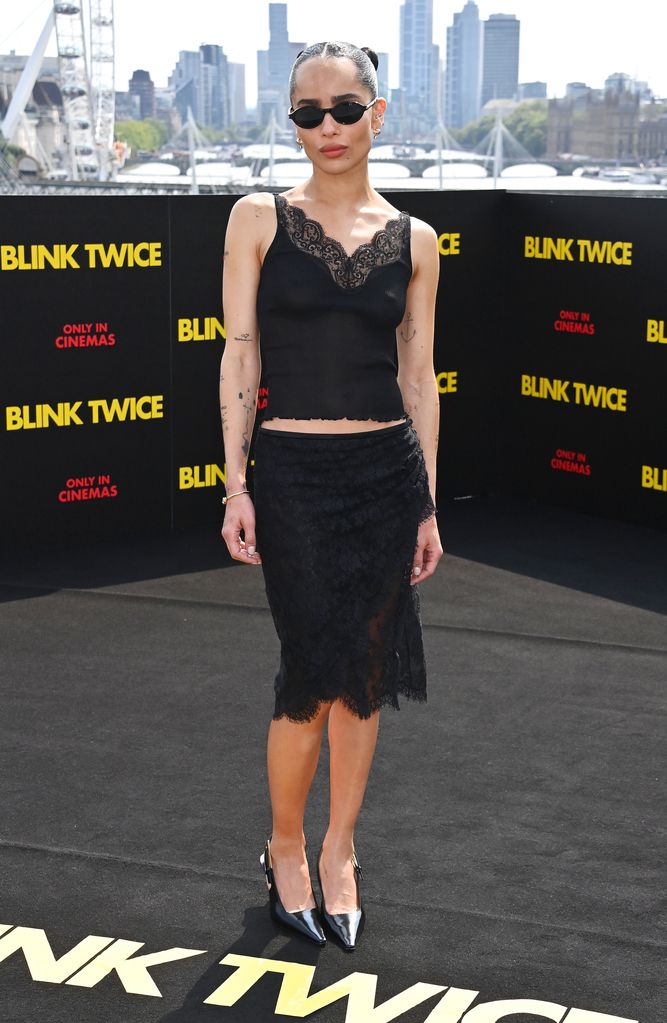 Zoe Kravitz attends the "Blink Twice" photocall at IET London: Savoy Place on August 18, 2024 in London wearing a black Saint Laurent look