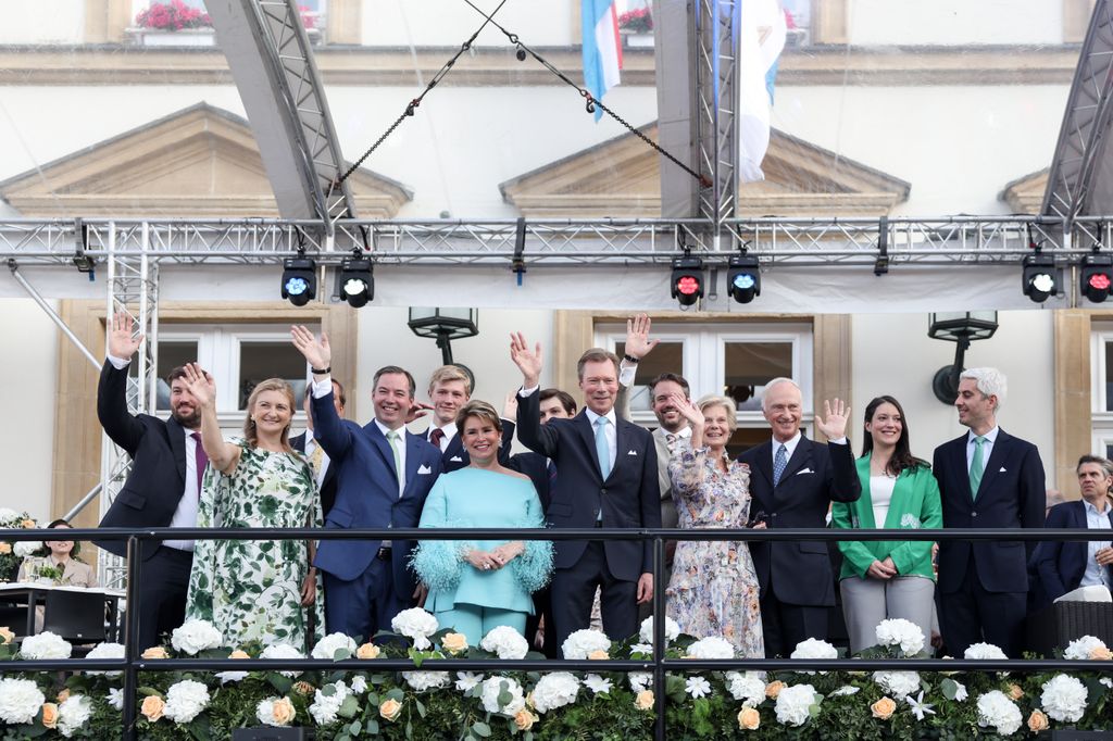 luxembourg royals smiling and waving on balcony area 