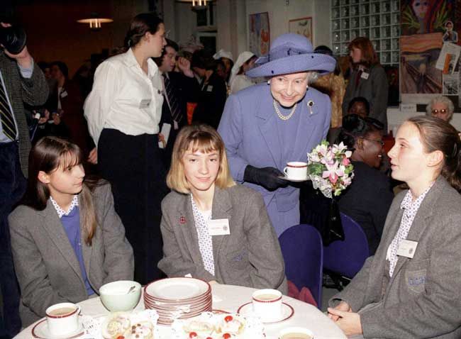 queen enjoying tea