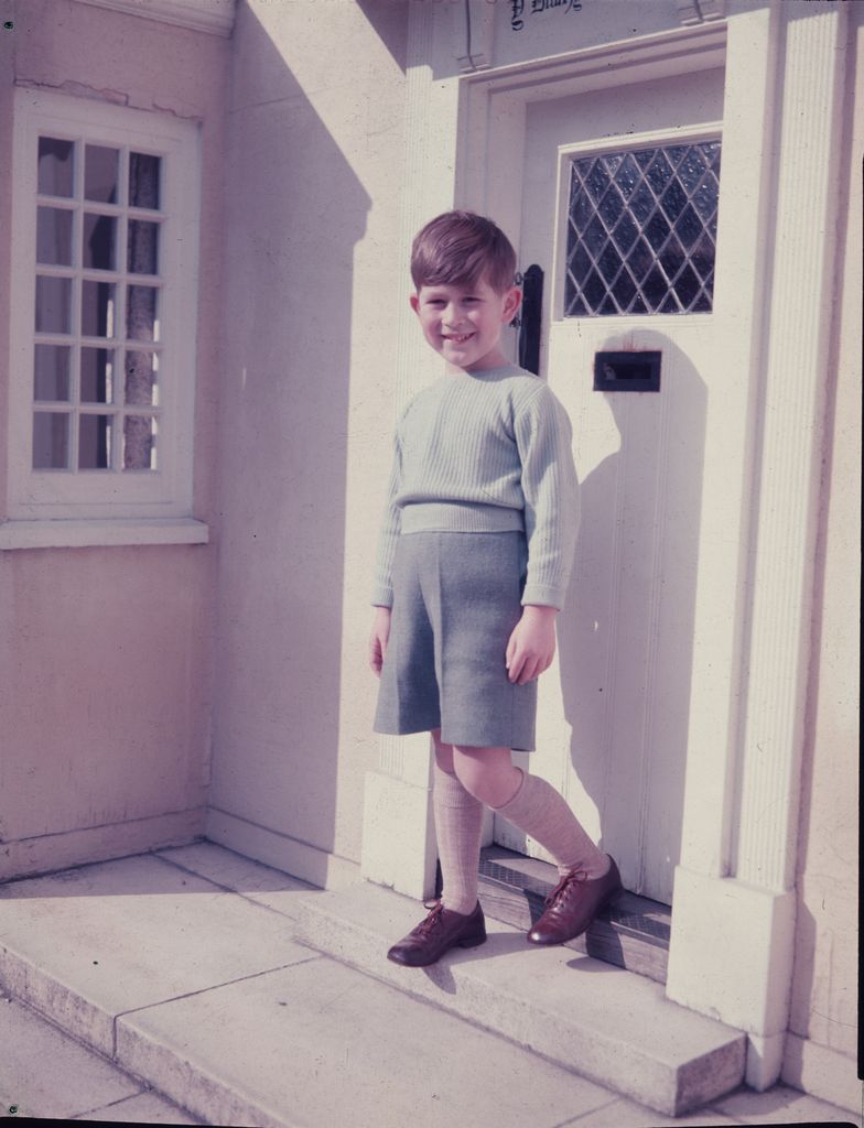 Young Prince Charles outside the little Welsh Cottage at the Royal Lodge at Windsor