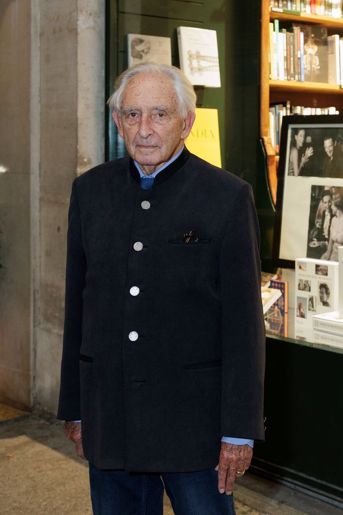 Prince Michael of Greece and Denmark outside a book store