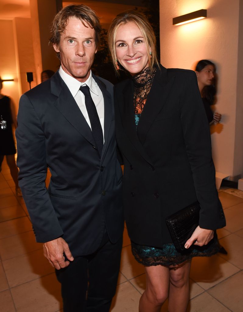 Danny Moder and Julia Roberts smiling at an event