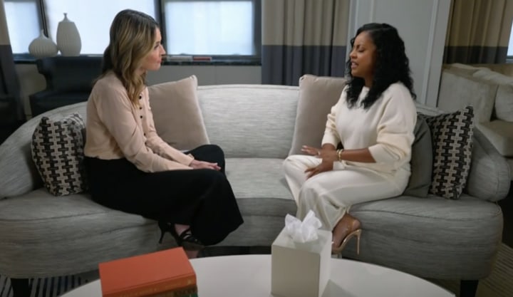 Sheinelle Jones in white outfit sat on sofa with Savannah Guthrie