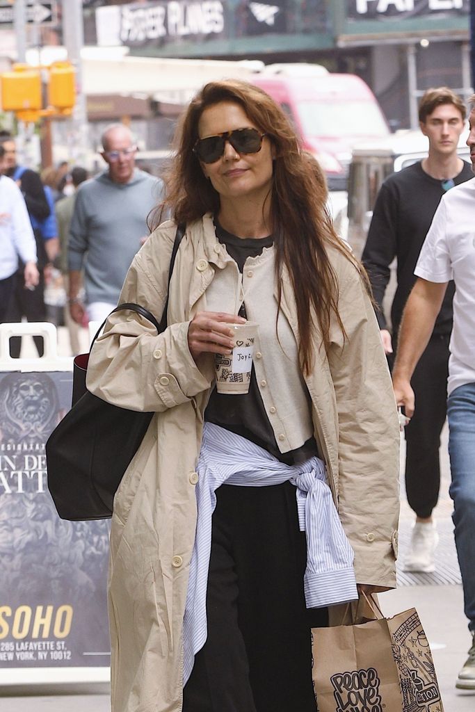 Katie Holmes went undercover on her coffee run, opting for the name 'Joyful' 

