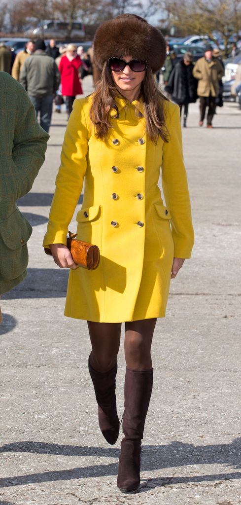 Pippa Middleton attends Day 3 of The Cheltenham Festival at Cheltenham Racecourse on March 14, 2013 in London, England. 
