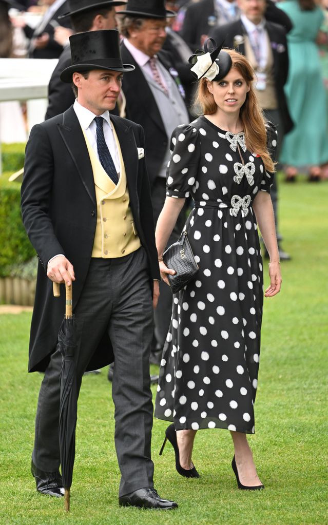 Princess Beatrice in a polka dot dress with a Philip Treacy fascinator with Edoardo