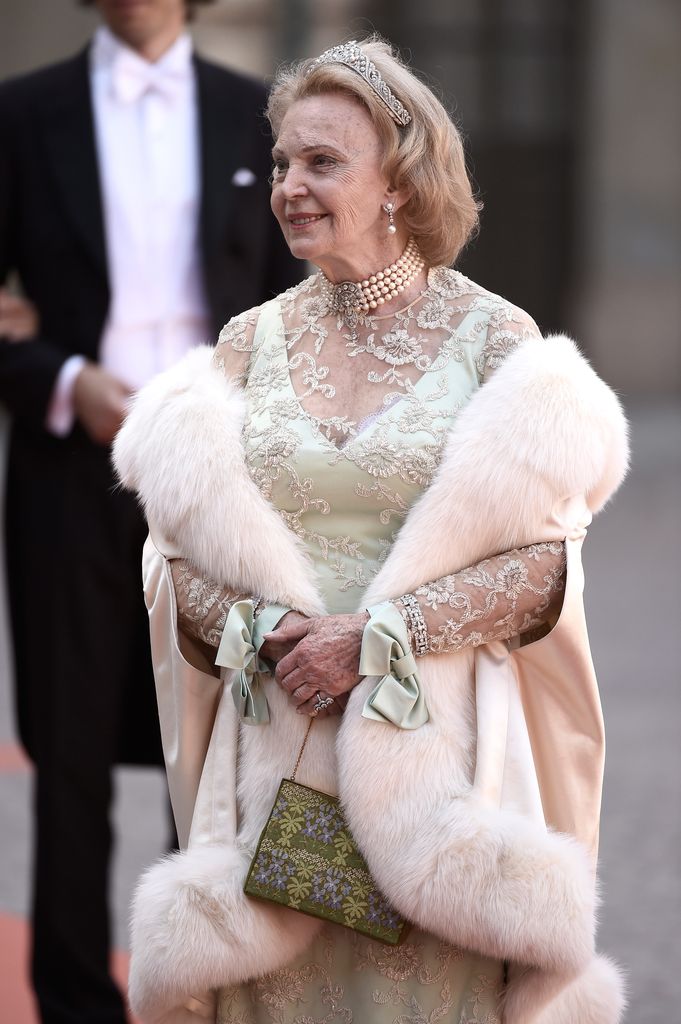 Countess Marianne Bernadotte in a fur coat and semi-sheer dress