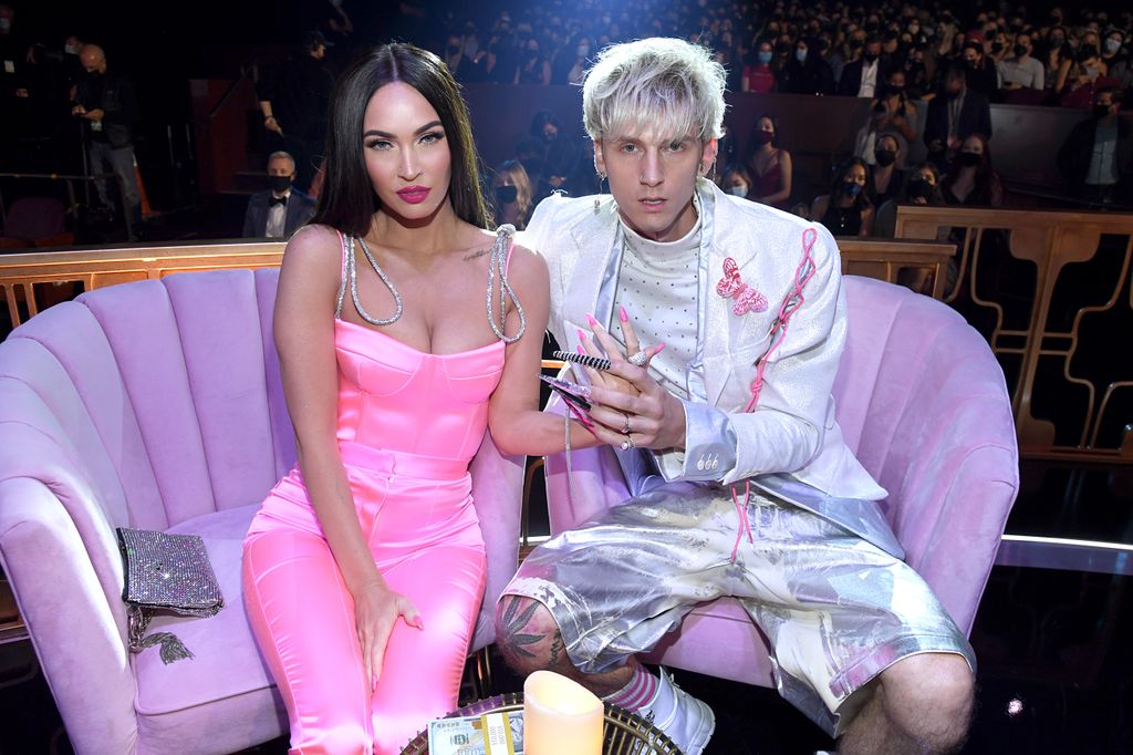 LOS ANGELES, CALIFORNIA - MAY 27: (EDITORIAL USE ONLY) (L-R) Megan Fox and Machine Gun Kelly attend the 2021 iHeartRadio Music Awards at The Dolby Theatre in Los Angeles, California, which was broadcast live on FOX on May 27, 2021. (Photo by Kevin Mazur/Getty Images for iHeartMedia)