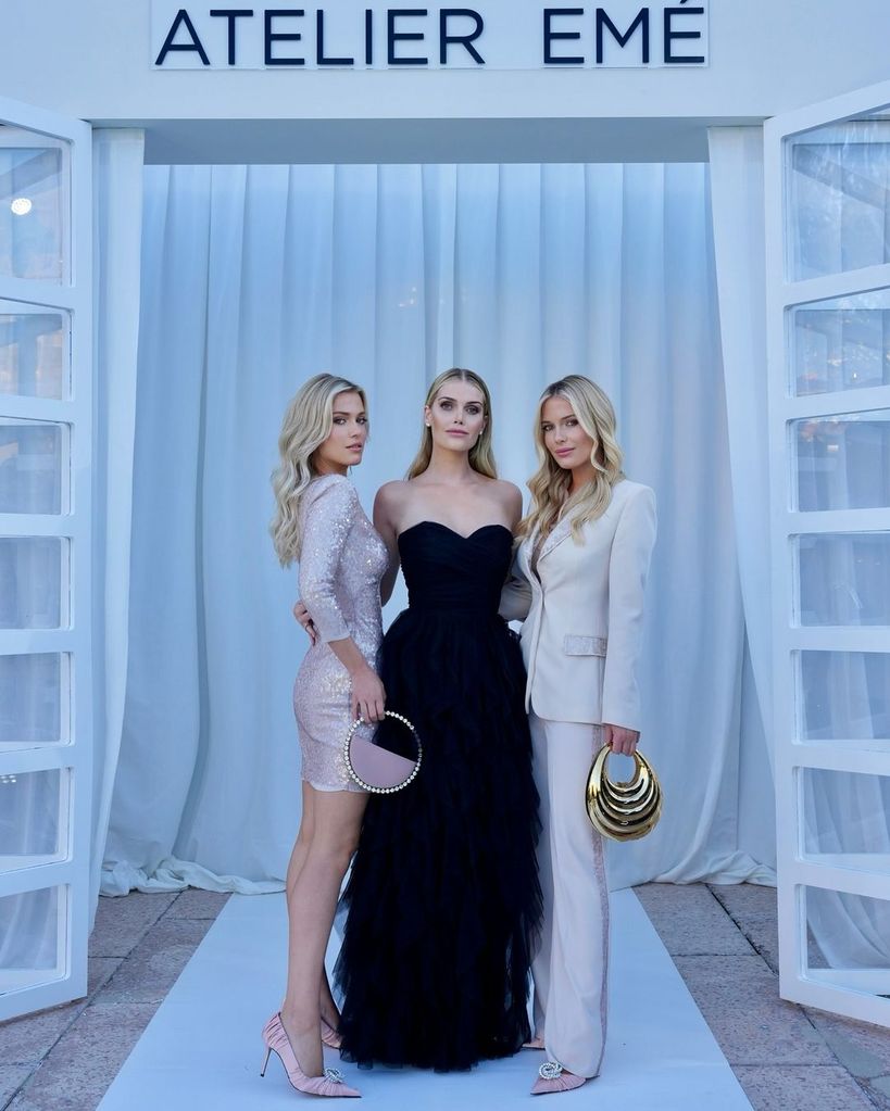 (L-R) Lady Eliza Spencer, Lady Kitty Spencer and Lady Amelia Spencer attend the Aterlier Emé show in Milan