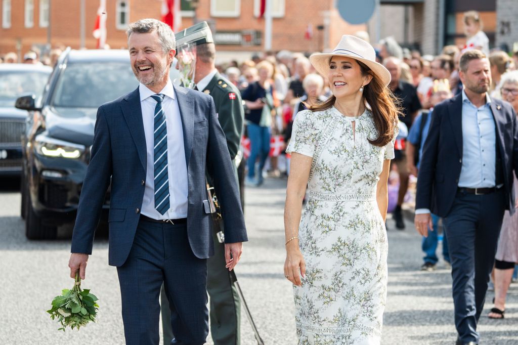 King Frederik X of Denmark and Queen Mary of Denmark are welcomed by the public as they arrive in Graasten