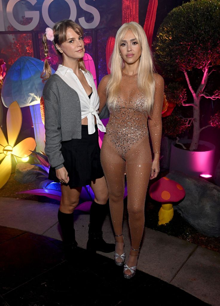 Kelly Sawyer Patricof and Jessica Alba dress as Britney Spears looks from music videos 