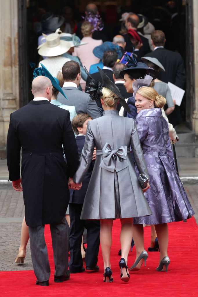 Zara Phillips walking next to Autumn Phillips at William and Kate's wedding