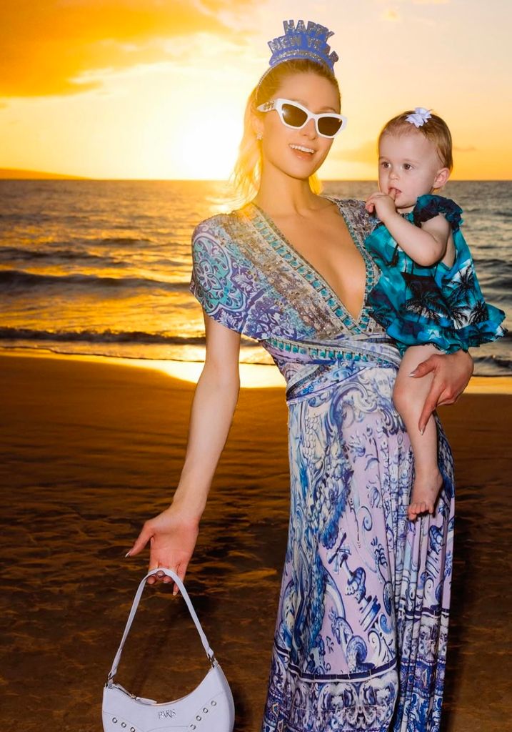 Paris Hilton maxi dress on the beach for NYE