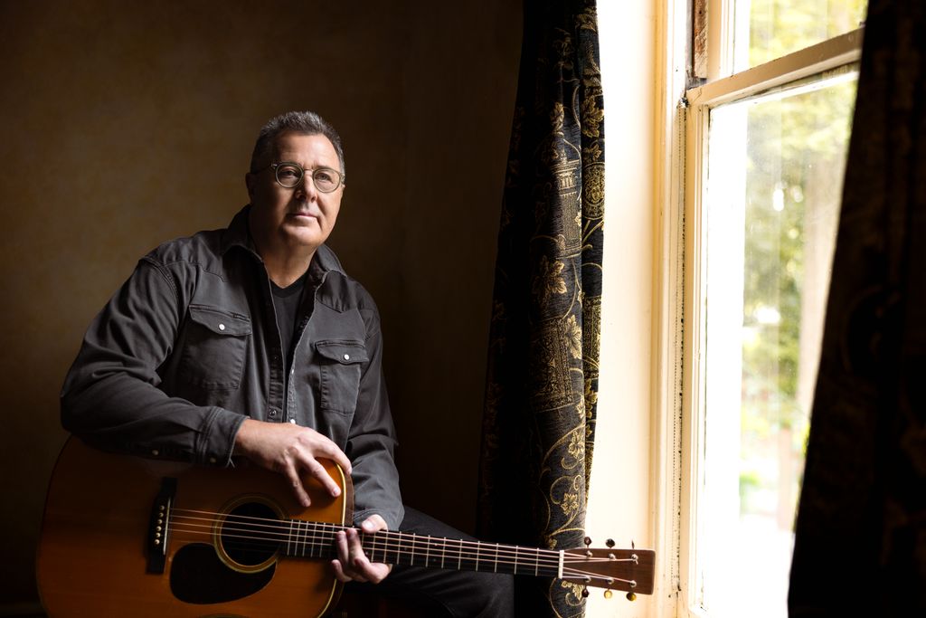 photo of vince gill with guitar