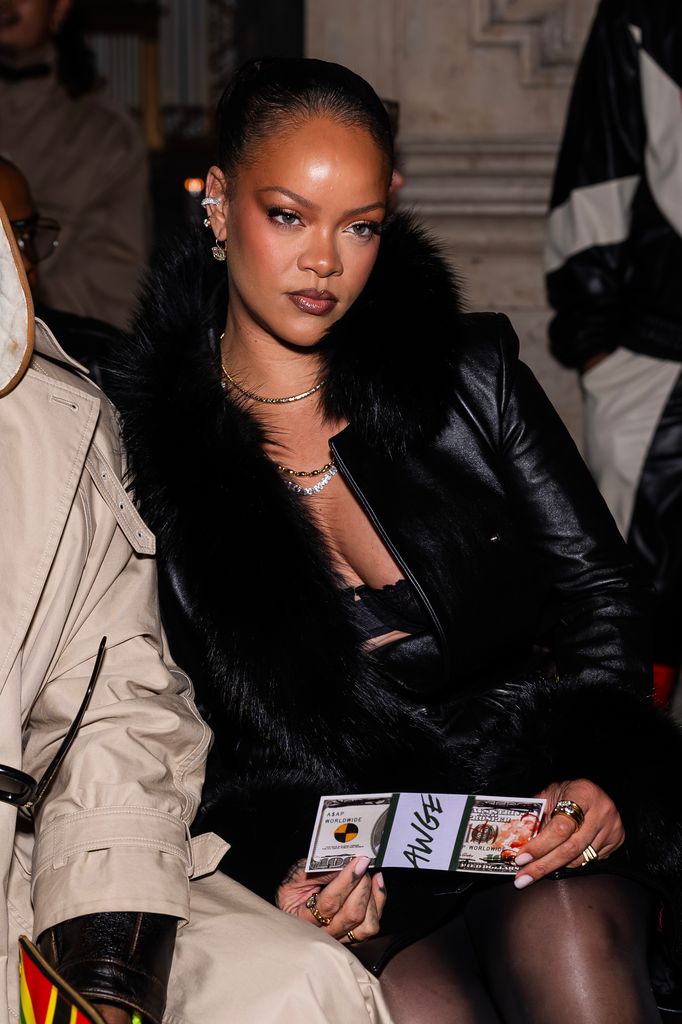 Rihanna attends the AWGE fashion show 