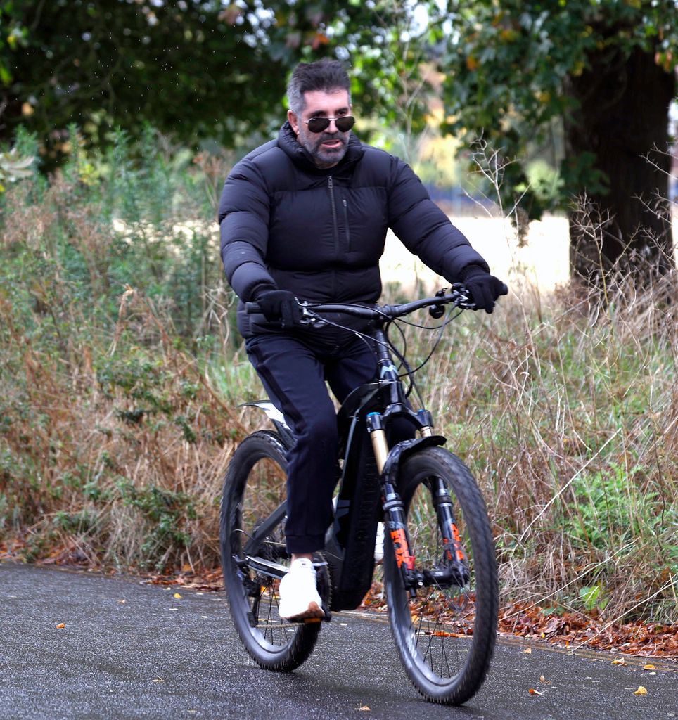 Simon Cowell seen back in the uk speeding along the roads of London on his new fox electric bike worth and estimate £5000. 