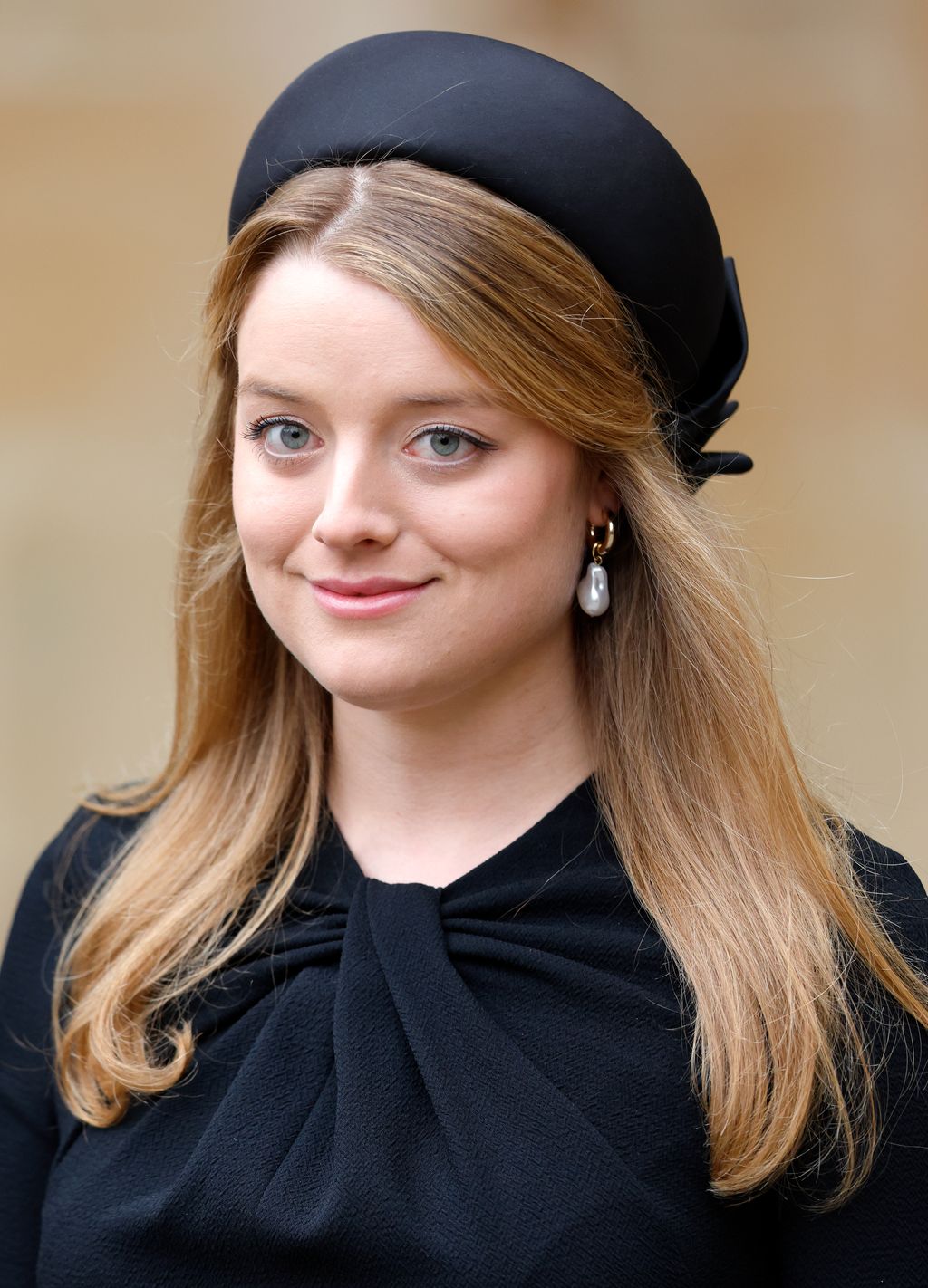 Flora Vesterberg wearing black hat 