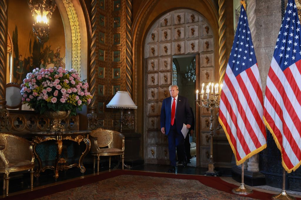 PALM BEACH, FLORIDA - APRIL 12: Republican presidential candidate former President Donald Trump arrives for a press conference with Speaker of the House Mike Johnson (R-LA) at Mr. Trump's Mar-a-Lago estate on April 12, 2024, in Palm Beach, Florida. The meeting is being reported as a visit to address "election integrity," which has been one of the former president's top issues.  (Photo by Joe Raedle/Getty Images)