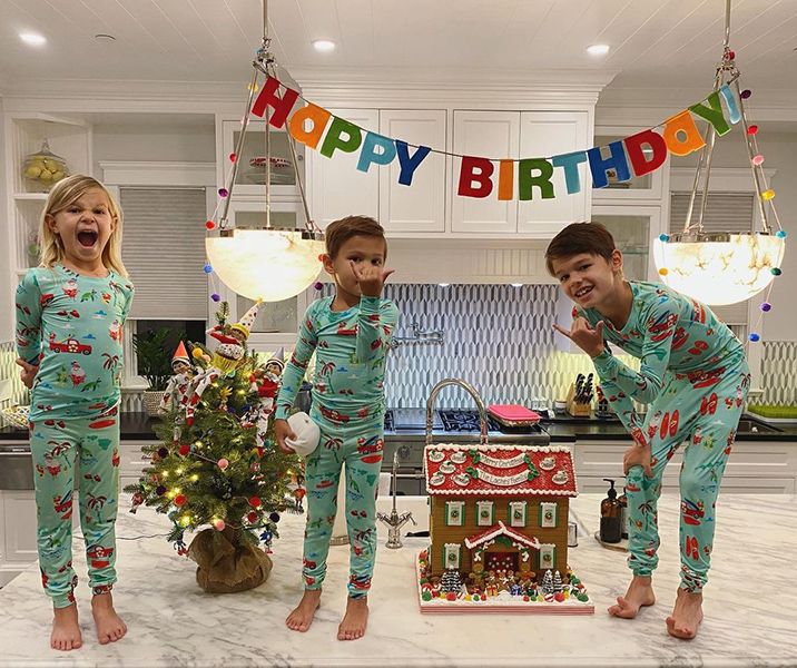 vanessa lachey three kids standing on counter in kitchen at hawaii home