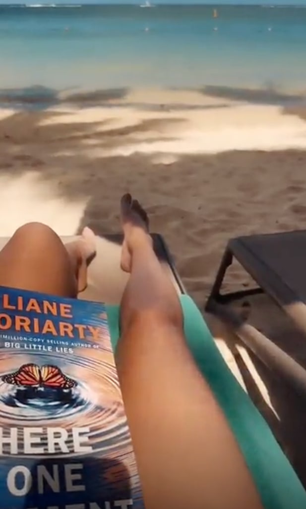 Holly relaxed on the beach with her new favourite novel