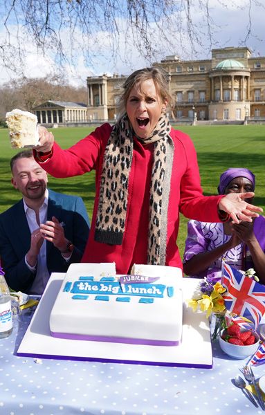 mel giedroyc with slice of cake at jubilee big lunch buckingham palace