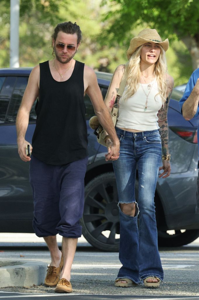 Paris Jackson walking with her fiancé Justin Long