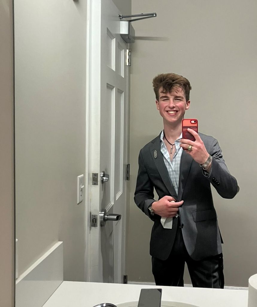 Iain posing in a mirror selfie