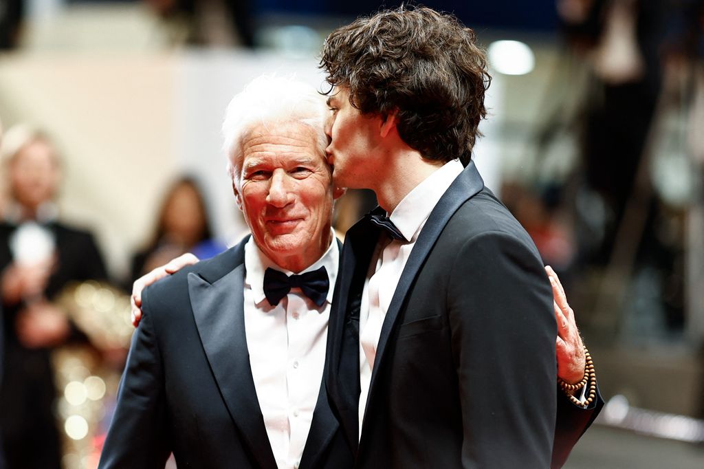 US actor Homer James Jigme Gere (R) kisses his father US actor Richard Gere after the screening of the film "Oh Canada"