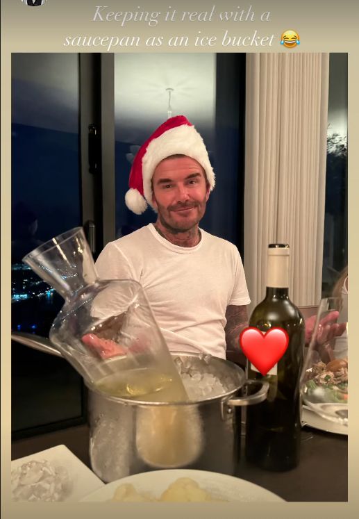 David Beckham in front of a bottle resting in a saucepan full of ice