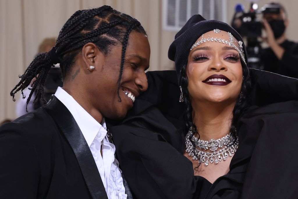 Rihanna and ASAP Rocky in black oufits smiling