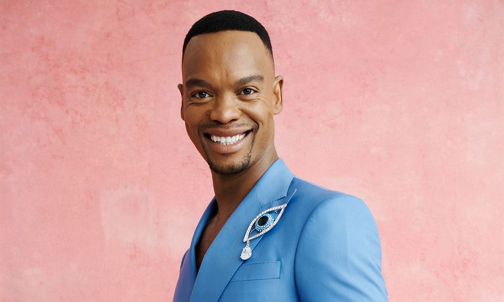 Strictly Come Dancing's Johannes Radebe wears a blue suit